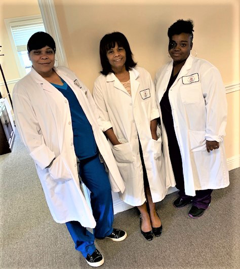 Photo of three members of the team