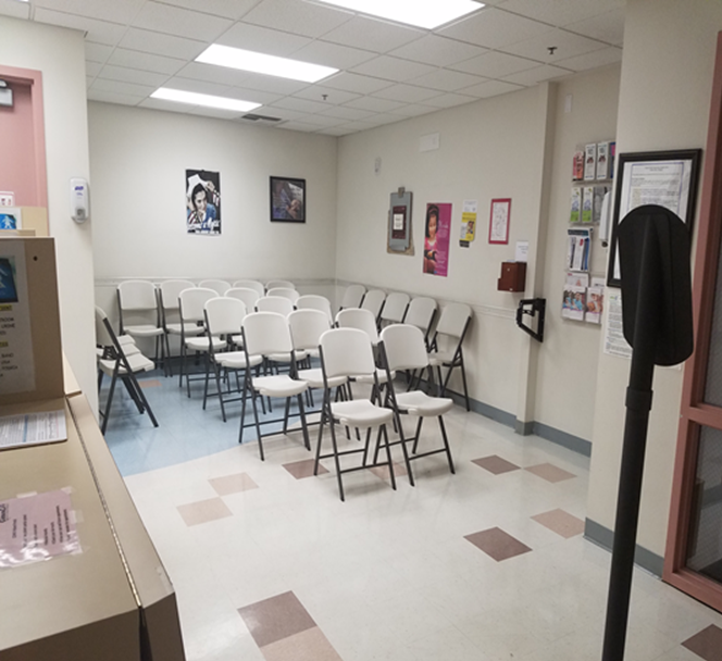 Carson City waiting room before improvement. Cluttered waiting room with no flow.